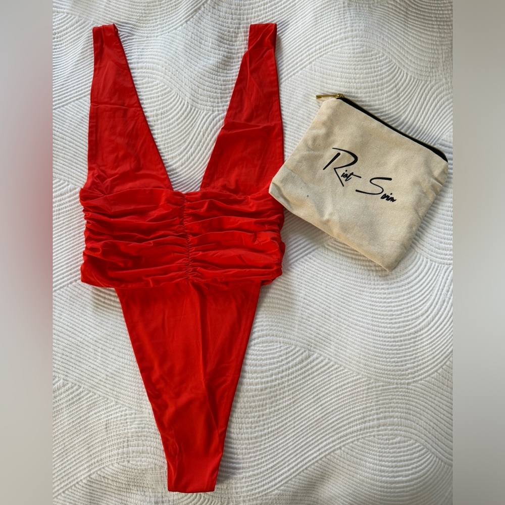 New with tags, never worn, original sanitary liner, original bag. Ready to ship!